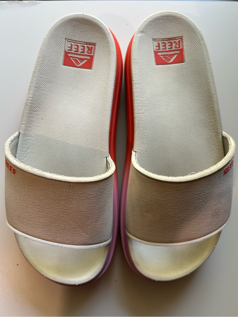 Reef Women's Slide Sandals in White, Pink, and Tan